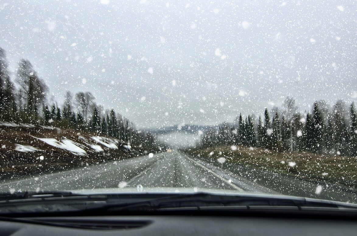 A car driving through snow